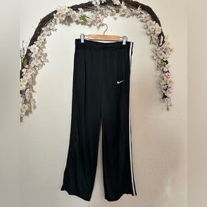 Nike Kids Black Joggers with White Stripe